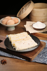 Handmade Chinese Meat Cake with Bamboo Steamer and Traditional Cooking Ingredients