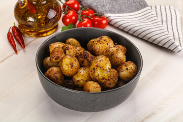 Baked mini potato with herbs