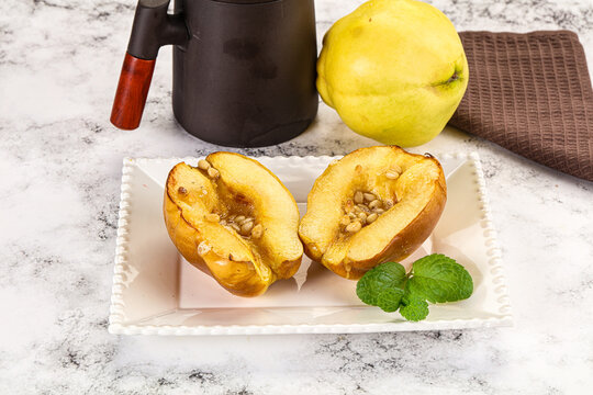 Baked quince with honey and cedar