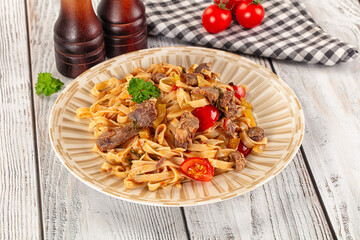 Asian udon noodles with beef