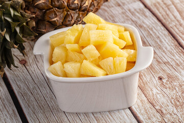 Sweet canned pineapple fruit pieces
