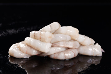Fresh Raw Shrimp Seafood Pile on Dark Surface - Premium Marine Ingredient for Culinary Cooking