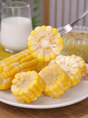 Fresh Boiled Corn on the Cob Slices with Milk Glass - Healthy Vegetable Meal