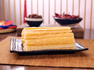 Handmade Wide Noodles with Cow Tendon Traditional Henan Chinese Cuisine on Wooden Board