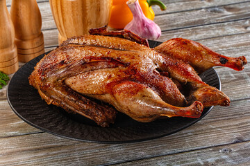Baked with spices whole duck