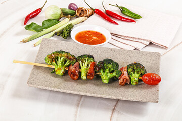 Thai Street foof satay with bacon and broccoli