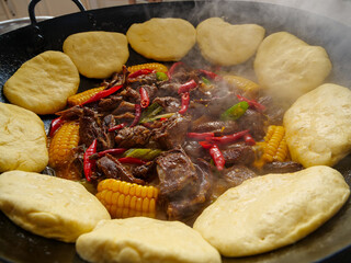 Braised Beef Stew with Corn and Dumplings in Cast Iron Skillet - Traditional Home Cooking