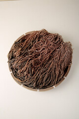 Dried Red Mui Cabbage Cantonese Preserved Vegetable in Bamboo Basket Asian Cooking Ingredient