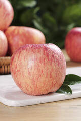 Fresh Red Fuji Apples with Water Droplets on Cutting Board - Healthy Organic Fruit Display