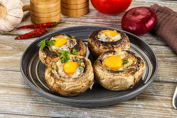 Baked champignon with quail egg