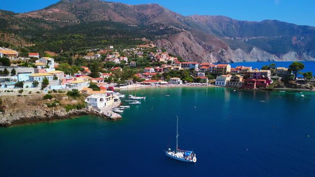 Discover Assos Village in Kefalonia &mdash; a colorful seaside gem with turquoise waters, charming houses, and stunning coastal views. A true hidden paradise in Greece! Made using the Dji Mini 4 PRO