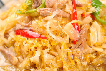 Homemade Braised Pork with Sauerkraut and Peppers Traditional Comfort Food Dish Close-Up