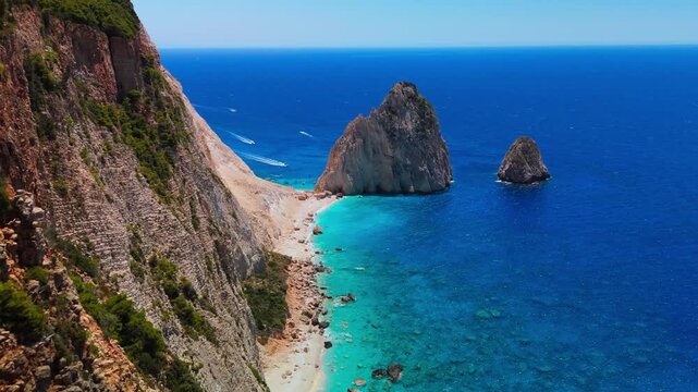 Experience the stunning Myzithres cliffs of Zakynthos &mdash; dramatic rock formations rising from turquoise waters, captured by drone in breathtaking detail. Made with Dji mini 4pro