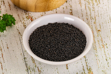 Black dry Nigella seeds in the bowl