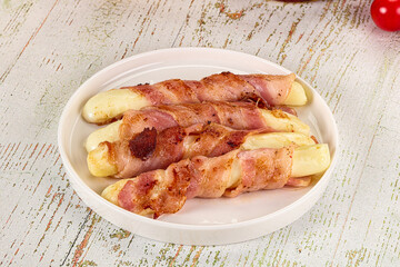 Hot mozzarella sticks with bacon