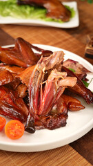 Roasted Duck with Sauce Chinese Cuisine Traditional Meal on Wooden Table