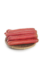 Fresh Red Carrots in Wicker Basket on White Background