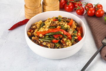 Eastern cuisine - Ptitim with beef and vegetables