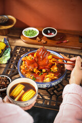 Delicious Chinese Braised Pig Trotters with Soybeans and Corn in Red Sauce Traditional Asian Cuisine