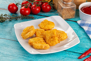 Golden crispy fried chicken nuggets