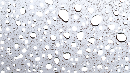 Close-up of water droplets on a transparent surface, creating a beautiful texture. Ideal for backgrounds or environmental themes.