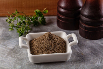 Ground dry black pepper powder