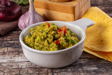 Green spicy Mexican guacamole dip