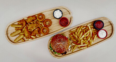 Delicious meat kebab with fresh vegetable salad served with variety of Turkish dishes and appetizers. Top view of assorted Turkish food and meze, tasty and healthy Mediterranean cuisine. Top view.