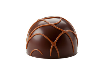 Isolated delicious dark chocolate candy truffle, decorated with lines of milk chocolate frosting