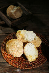 Lion's Mane Mushrooms in Wicker Basket on Wooden Table - Fresh Edible Fungi
