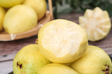 Fresh Yellow Guava Fruit Cut in Half Showing Creamy White Flesh and Heart-Shaped Interior Cross Section