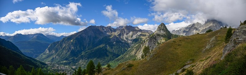 Extreme high resolution panorama color image made of five images combined into one, of the beautiful Italian town of Courmayeur Italy, famous spot for hosting TMB- Tour du Mont Blanc hikers