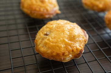 golden puff pastry bites filled with creamy brie cheese and fresh apple slices