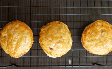 golden puff pastry bites filled with creamy brie cheese and fresh apple slices