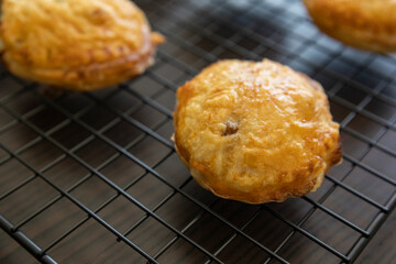 golden puff pastry bites filled with creamy brie cheese and fresh apple slices