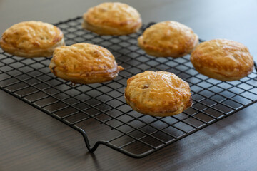 golden puff pastry bites filled with creamy brie cheese and fresh apple slices