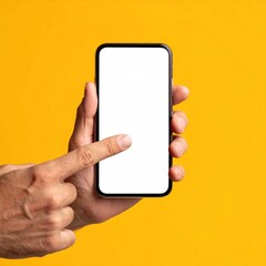 Hand holding a smartphone with a blank white screen against a bright yellow backdrop. Pointing finger suggests interaction or navigation