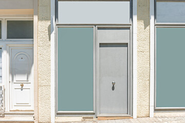 Commercial space with an industrial loft-style facade and black wrought iron glass partition