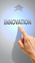A hand touches the word "INNOVATION" with a star arrow above it on a light blue gradient background, symbolizing progress and new ideas
