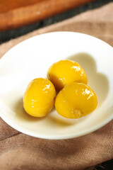 Candied Glazed Chestnuts on White Plate Traditional Asian Sweet Confection Yunnan Style Dessert