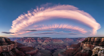 Grand canyon landscape with a large lenticular cloud formation at sunset with a blue sky above it ai generated