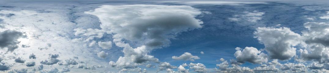 Obraz premium Seamless cloudy blue sky hdri panorama 360 degrees angle view with zenith and beautiful clouds for use in 3d graphics or game development as sky dome or edit drone shot