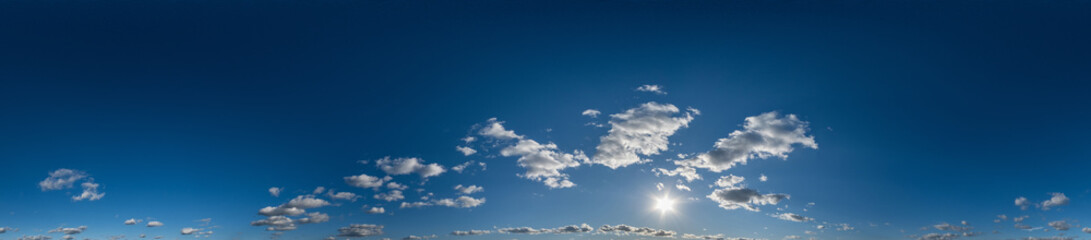 blue sky hdri 360 panorama with white beautiful clouds in seamless projection with zenith for use in 3d graphics or game development as sky dome or edit drone shot for sky replacement