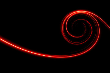 A striking glowing red neon spiral on a black background, symbolizing energy, creativity, and futuristic motion.