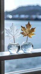 Two dried leaves, light & gold, in glass orbs