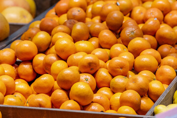 Fresh oranges in a box a lot of background