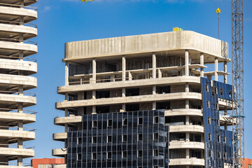 Tower Crane on formworks. Crane and building construction. Construction crane on Housing. Construction site, Multi Storey Residential Buildings construction. © NastyaPhoto
