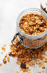 Granola cereal in glass jar for healthy breakfast