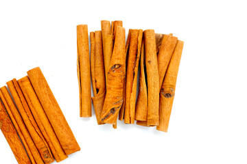 Dried cinnamon sticks arranged in a bundle.