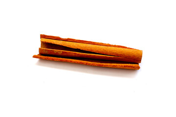 Dried cinnamon sticks arranged in a bundle.